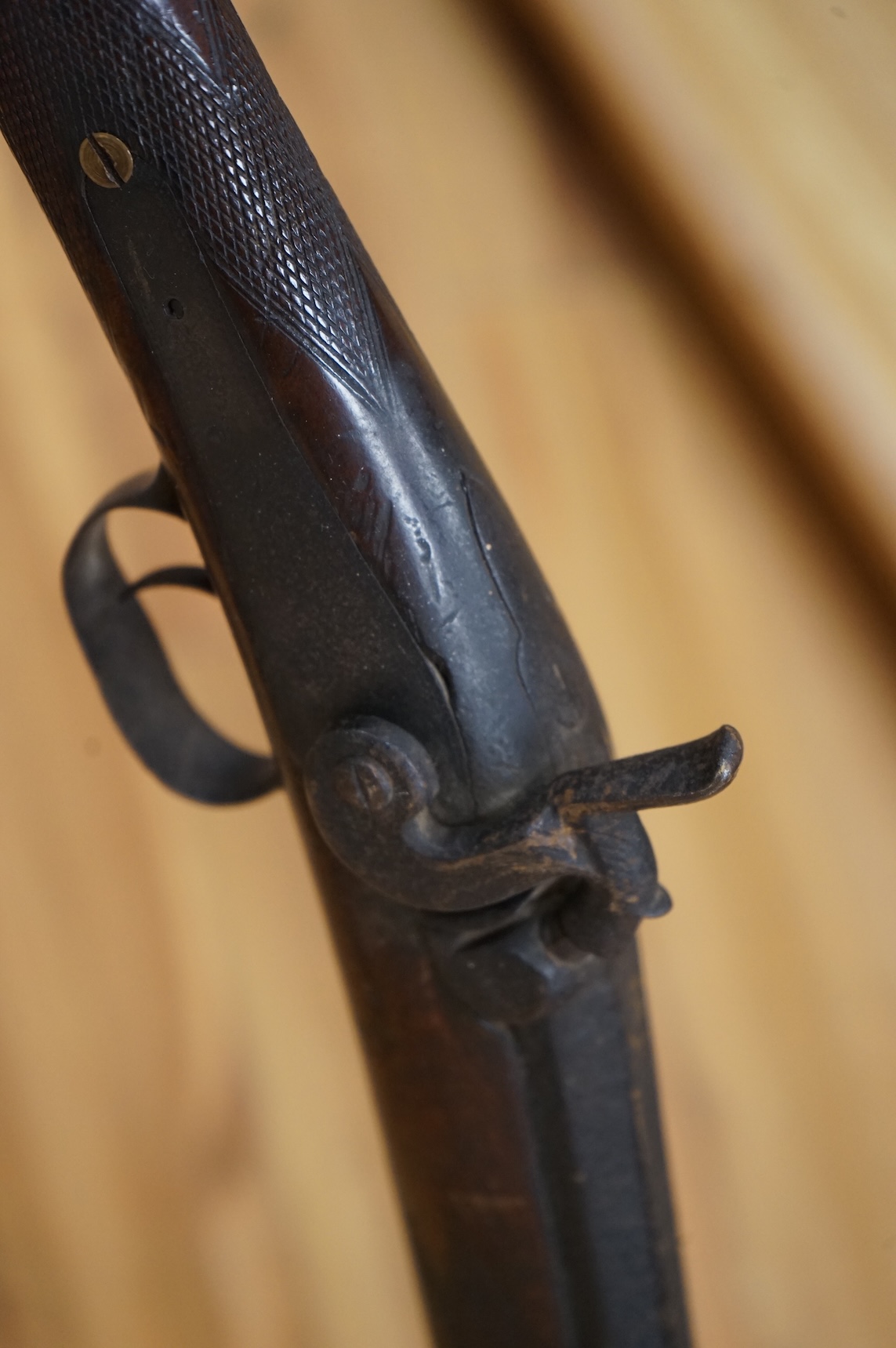 An English 16 bore back action, single barrel, percussion sporting gun, with half octagonal barrel half-stocked, barrel 82cm, iron mounted, chequered grip and fore end